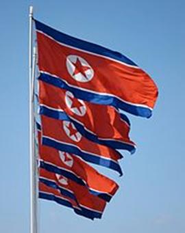 https://upload.wikimedia.org/wikipedia/commons/thumb/1/1a/Photograph_of_flags_of_North_Korea.jpg/180px-Photograph_of_flags_of_North_Korea.jpg